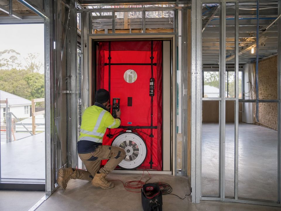 Air tightness test being carried out on a completed steel home