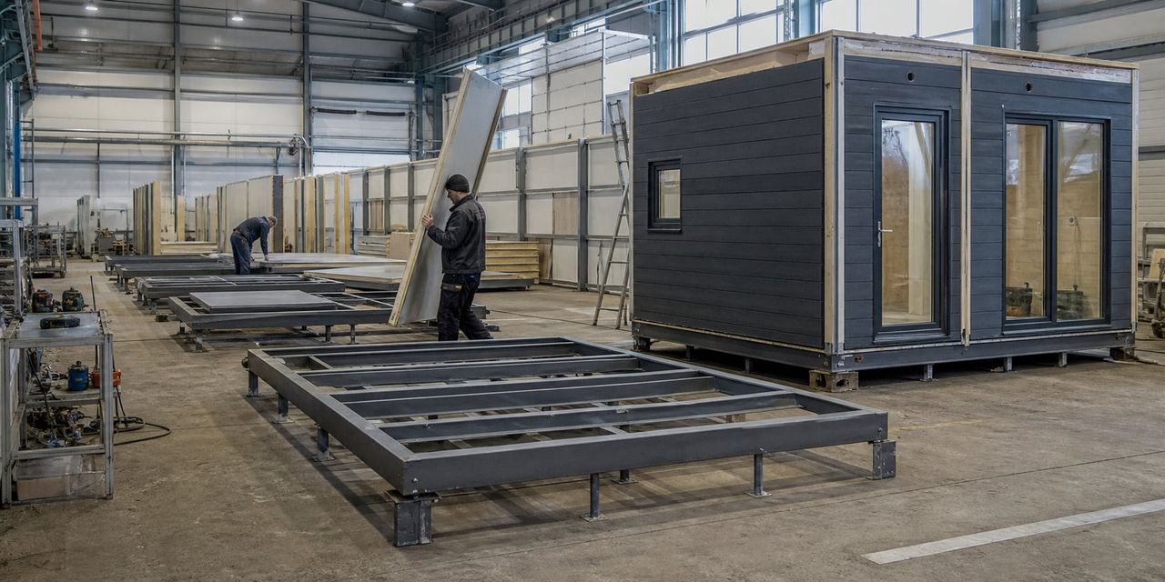 Compact cabin units being assembled and fitted out under factory conditions