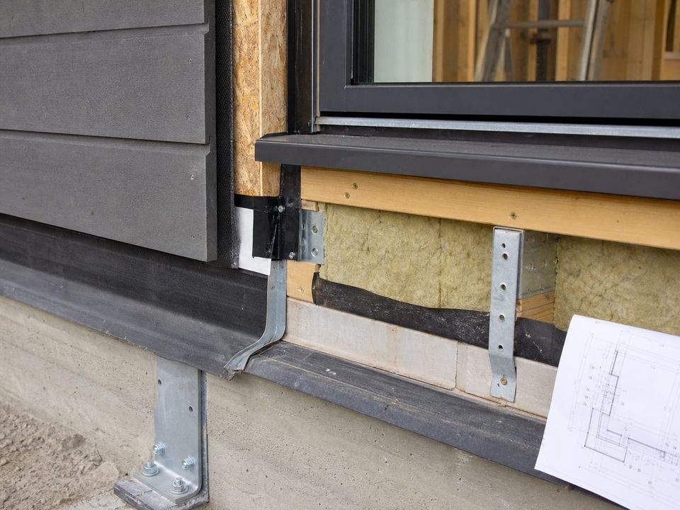 Prefab home junction detail showing insulation continuity and vapour control