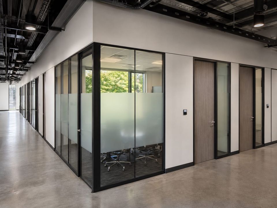 Prefab office meeting and focus rooms planned for collaboration, privacy, and video calls