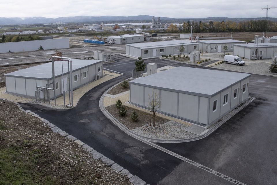 Coordinated prefab site buildings arranged around safe pedestrian and vehicle routes