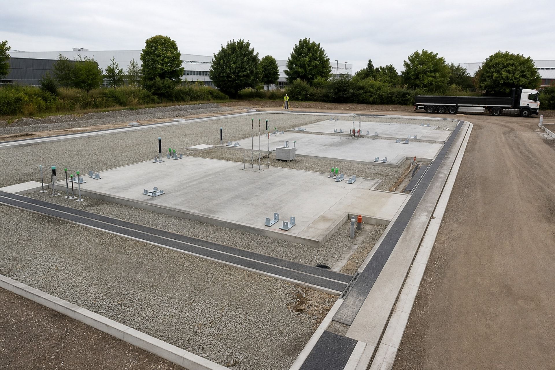 Prepared modular building site with foundations and utility connections