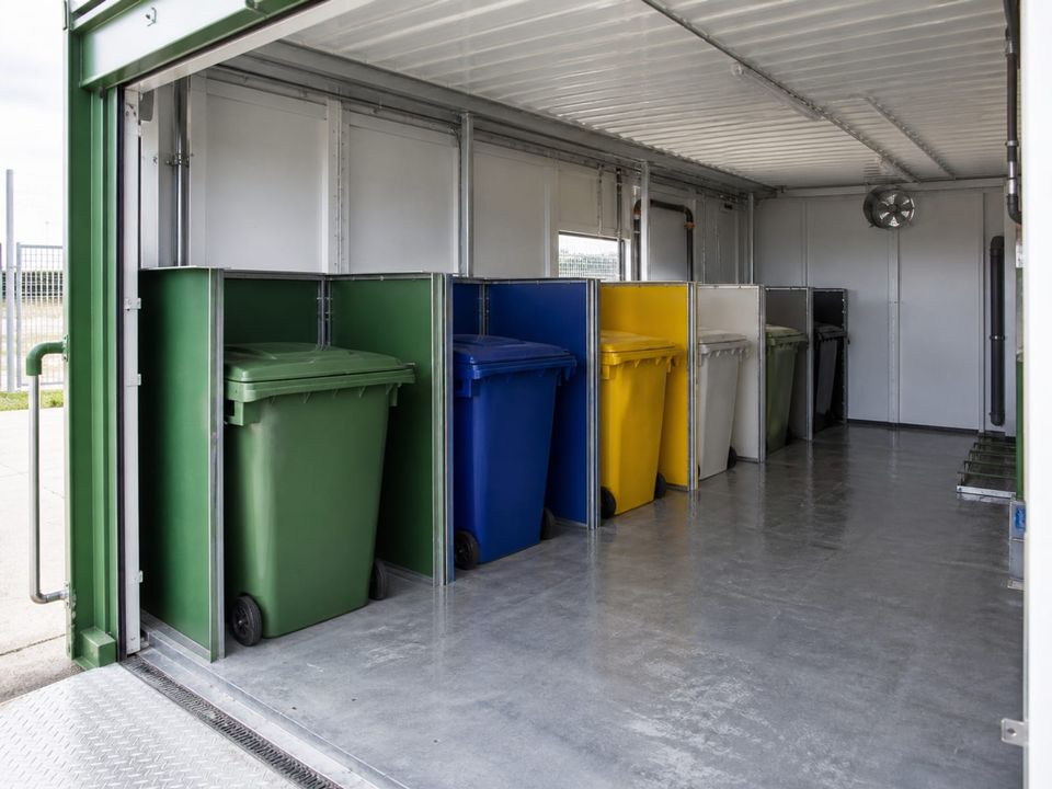 Waste container with segregated and labelled compartments for separate recycling streams