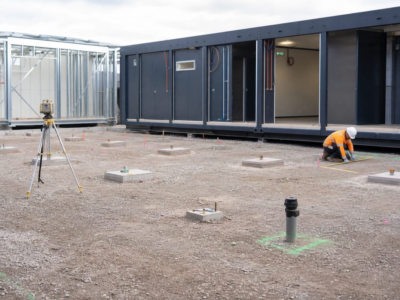 Container units being set out on site according to an approved layout plan