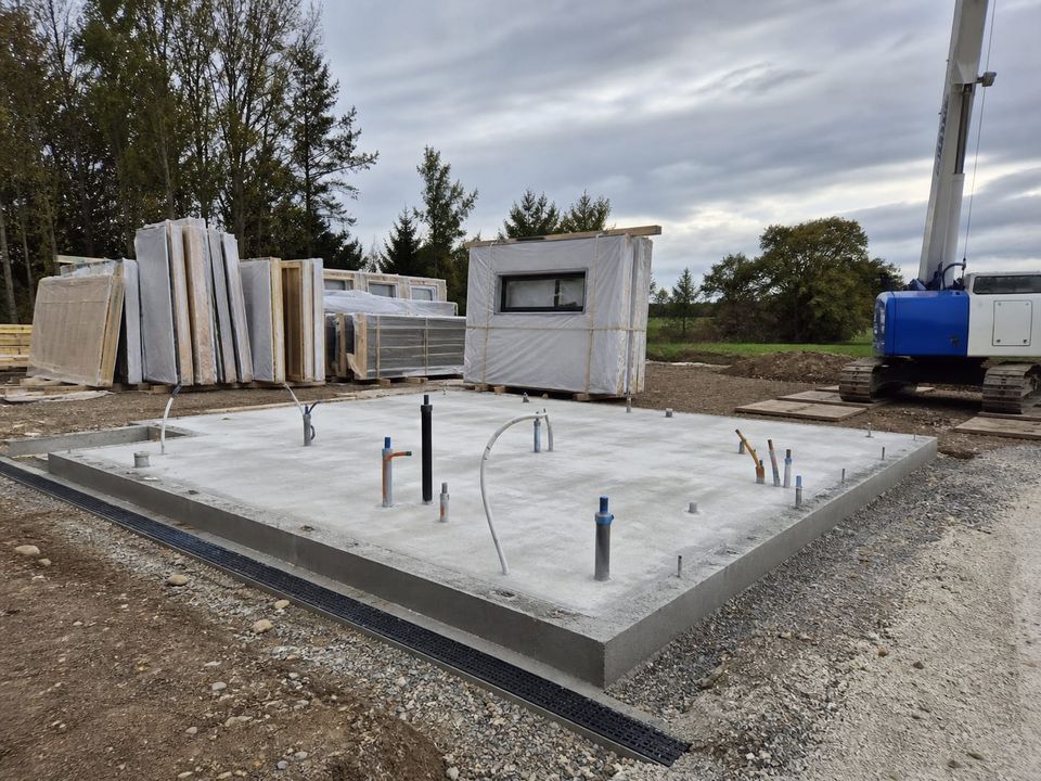 Prefab home site works showing foundations and service connection positions